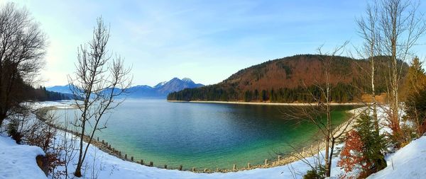 Scenic view of lake against blue sky