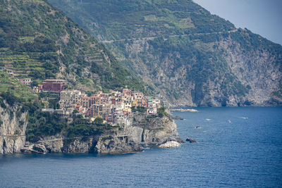 Aerial view of townscape by sea