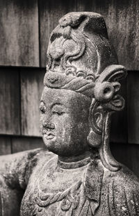 Close-up of statue against temple