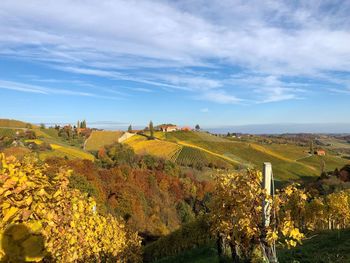 Scenic view of field against sky during autumn