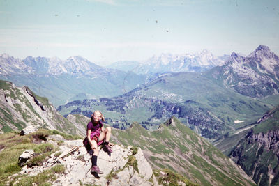 Woman on mountain range