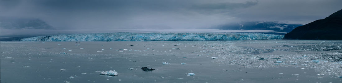 Scenic view of sea against sky during winter