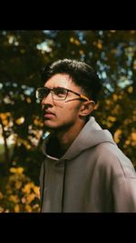 Portrait of young man looking away