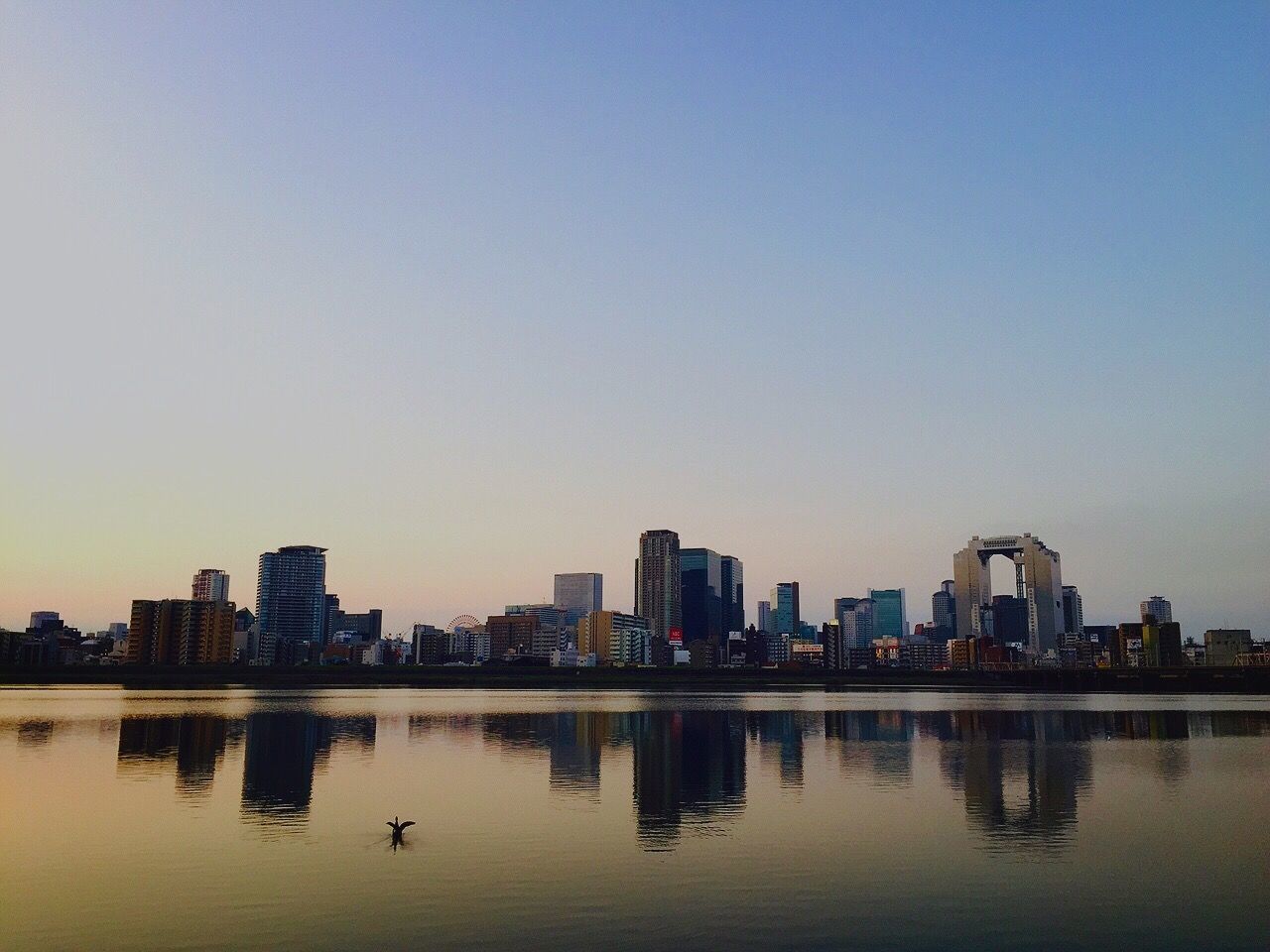 building exterior, waterfront, architecture, water, built structure, city, clear sky, copy space, reflection, cityscape, sunset, urban skyline, skyscraper, river, skyline, building, office building, sky, residential building, modern