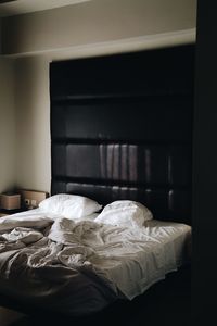 Close-up of white bed in bedroom