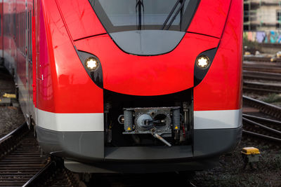 Train on railroad track in city