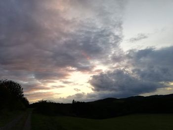 Scenic view of silhouette landscape against sky during sunset