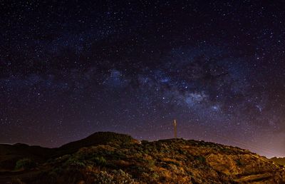 Scenic view of star field against sky at night