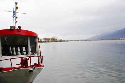 Boat on shore against sky