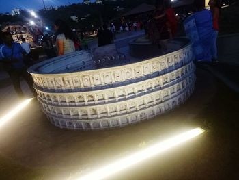 High angle view of people at illuminated market