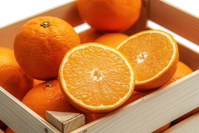 Close-up of oranges on table