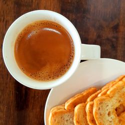 Close-up of coffee served on table