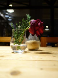 Close-up of drink in vase on table