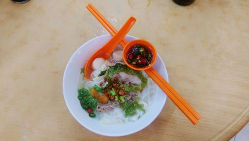 High angle view of salad in bowl on table