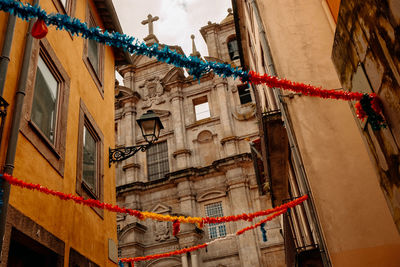 Low angle view of clothes hanging on building