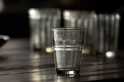 An old, historic, soviet time glasses on the table. indoors photo of drinks in glasses.