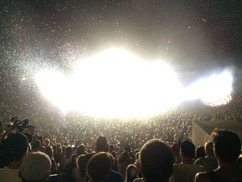 People enjoying music concert