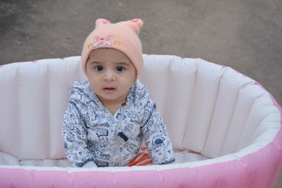 Portrait of cute girl wearing hat