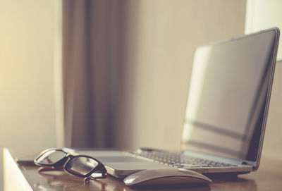 Close-up of laptop on table