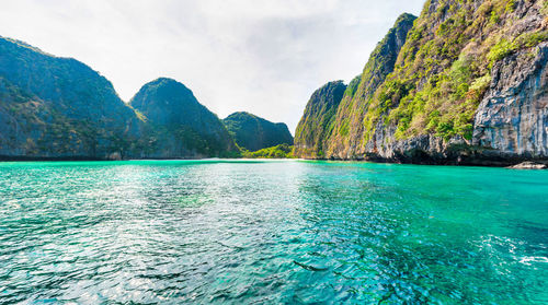 Scenic view of bay against sky