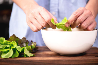 Close-up of person preparing food