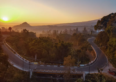 High angle view of road against sky during sunset