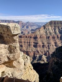 Panoramic view of rocks and mountains against sky