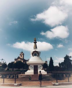 Statue of historic building against sky