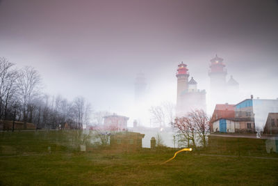 Kap arkona lighthouse in abstract multi-exposure. cold january rainy morning.