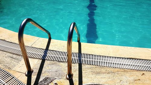 High angle view of railings by swimming pool