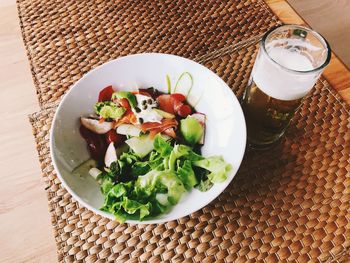 High angle view of fruit salad in glass on table