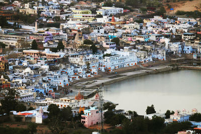 High angle view of residential district and lake