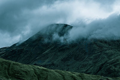 Scenic view of volcanic mountain against sky