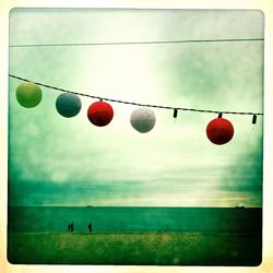 Close-up of red balloons against white background