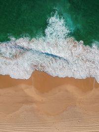 Aerial view of waves at beach