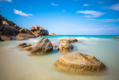 Long exposure shot of sea and the rocks on the beach in koh samui.