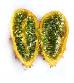 High angle view of lemon slice against white background