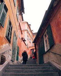 Man walking on street in city