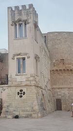 Low angle view of old building against sky