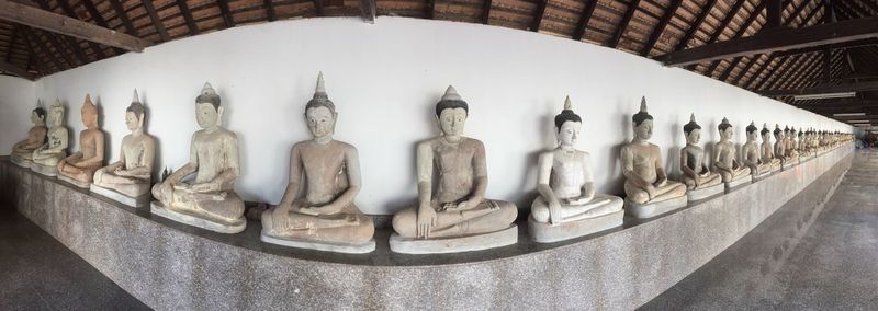 Sculpture of statues in building