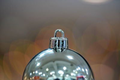 Close-up of electric lamp on table