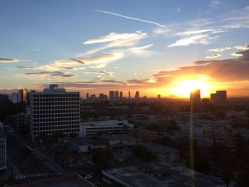 City lit up at sunset