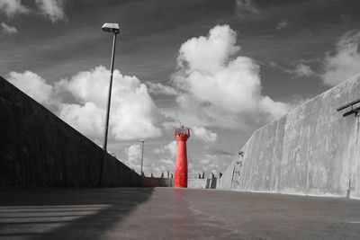 Street amidst buildings against sky