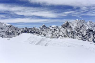 Scenic view of snow covered mountains