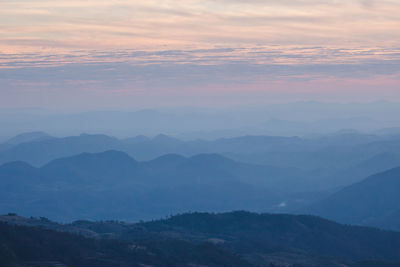 Scenic view of mountains against sky during sunset