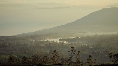 Scenic view of mountains against sky during sunset