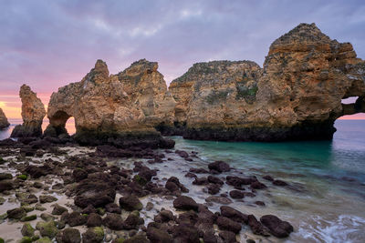 Praia do amado beach at sunset in costa vicentina, portugal