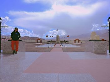 Man on mountain against sky