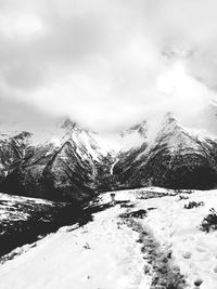 Snow covered mountain against sky