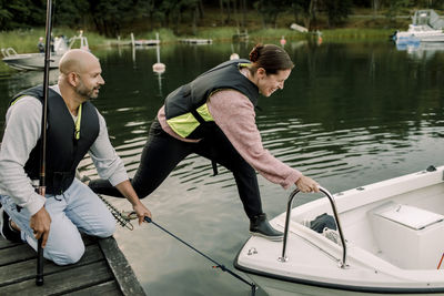 Men in boat on lake